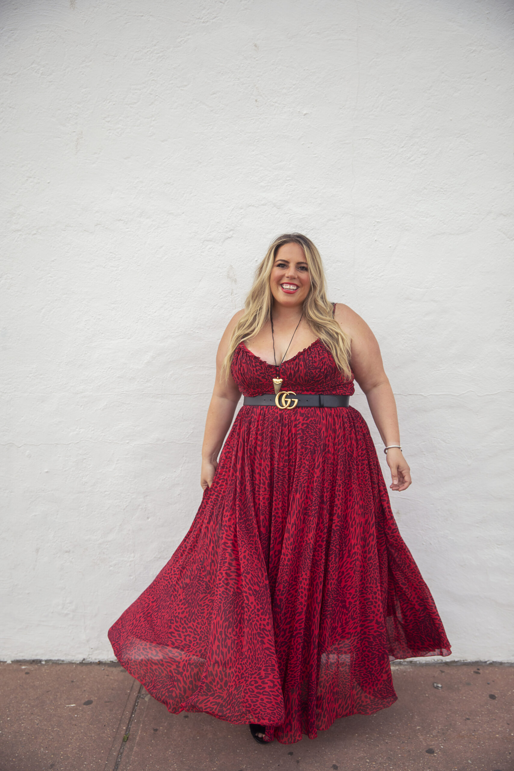 girl smiling in red dress